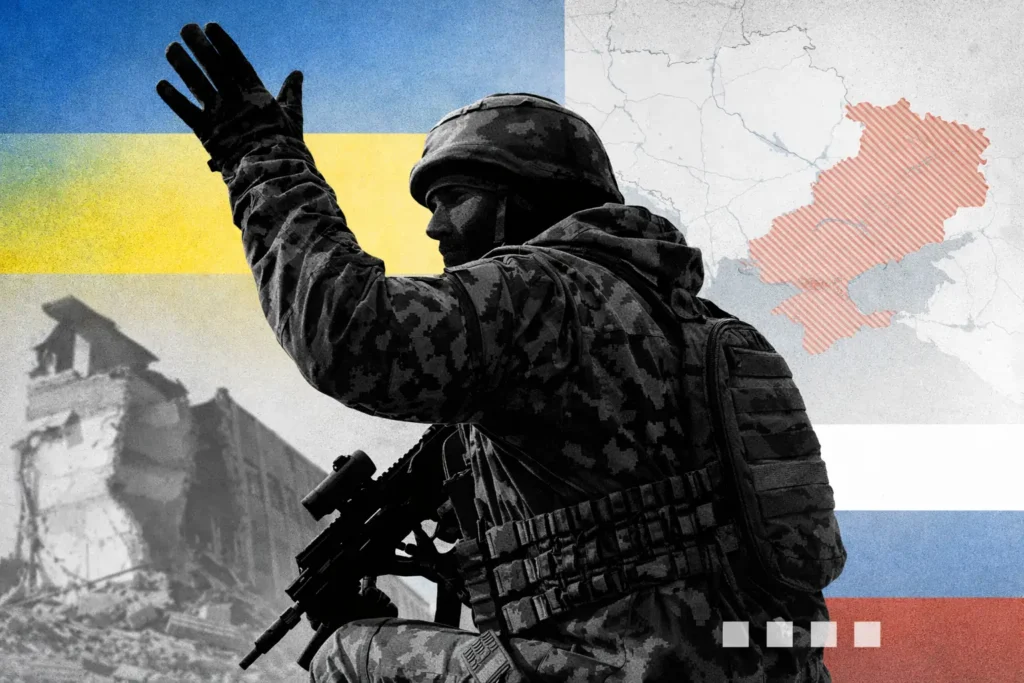 უკრაინელი ჯარისკაცი კონფლიქტის ზონაში რუკისა და სამხედრო მოქმედებების ვიზუალური სიმბოლოებით